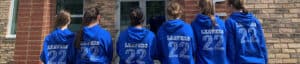 IIC Students with number 22 on the back of sweatshirts